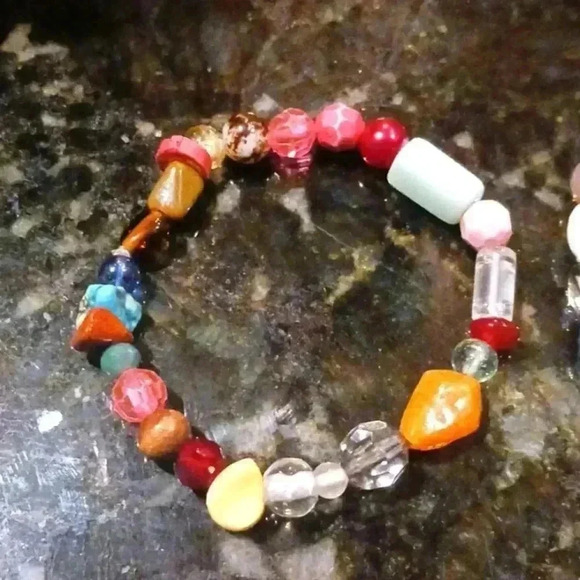 A set of four elastic beaded bracelets..perfect for anyone..size S in Adults - Picture 5 of 5